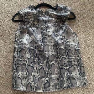 Size small blouse top , with a little bit of shoulder pads